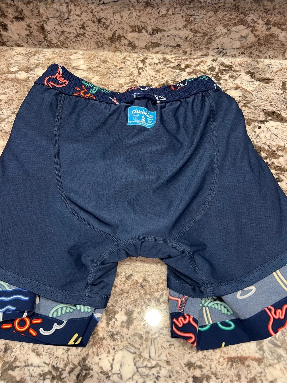 chubbies Navy Tropical Neon Print Swim Trunks